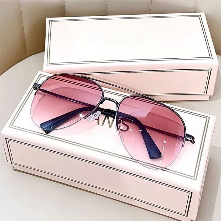 Close-up of men's gradient pilot sunglasses showing UV400 anti-glare lenses.