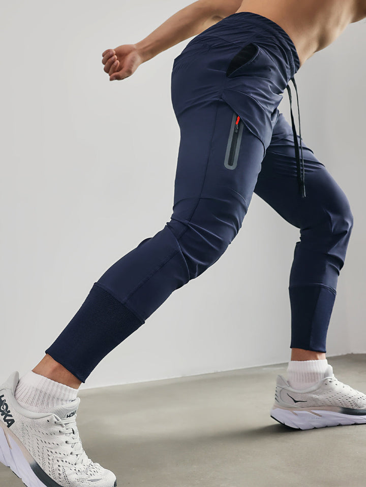 Practical men's joggers with spacious cargo pockets, perfect for carrying essentials on the go.