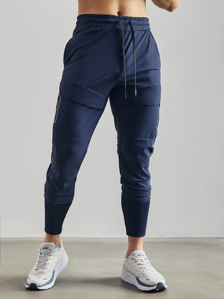 Comfortable men's activewear cargo joggers with utility pockets, perfect for workouts or casual outings.
