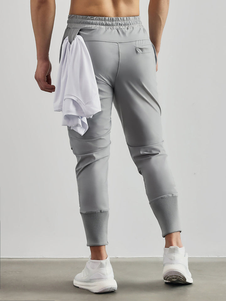 Granada men's activewear joggers, offering a comfortable fit and practical cargo pockets for essentials.
