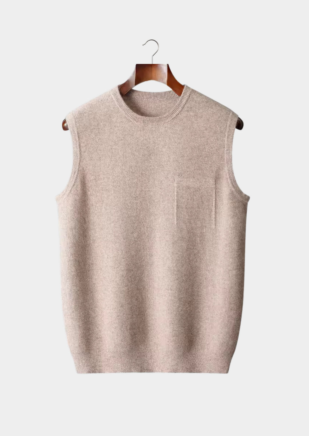 Versatile men's gray crew neck vest. Regular fit, comfortable sleeveless top for stylish, casual layering.