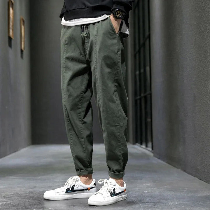 Men's cotton blend sweatpants, tapered fit, ideal for lounging or active lifestyles.