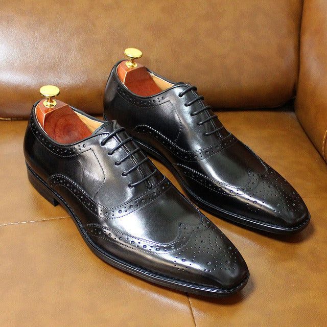 Classic men's brown leather brogue Oxford shoes, handcrafted for a refined formal look and business wear.