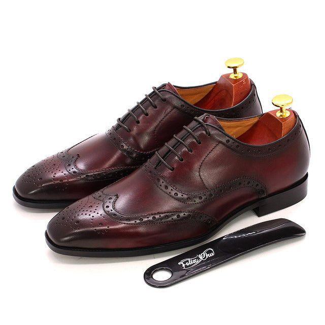 Premium men's handcrafted brown leather wingtip Oxford shoes, offering classic brogue style for formal fashion.