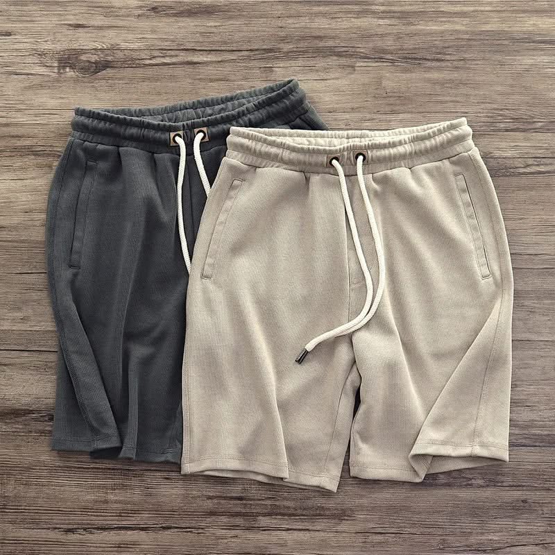 Men's Harlan relaxed fit athletic shorts in black, perfect for comfort & style during workouts or casual wear.