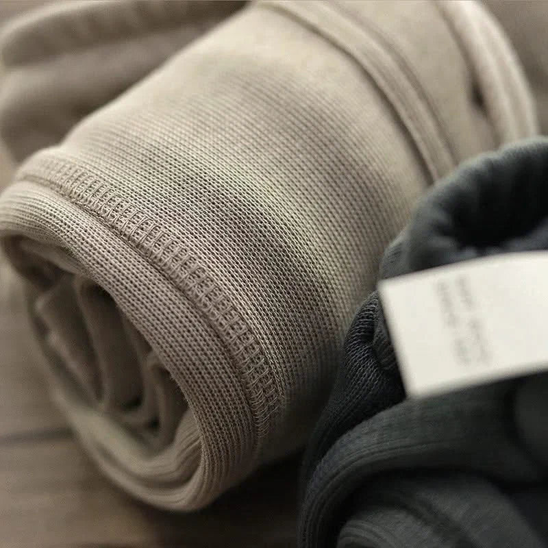 Grey Men's Harlan relaxed fit gym shorts, designed for ultimate comfort & performance during intense workouts.