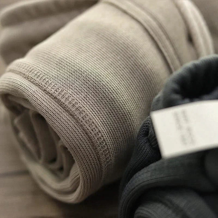 Grey Men's Harlan relaxed fit gym shorts, designed for ultimate comfort & performance during intense workouts.