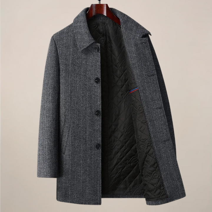 Tailored men's herringbone car coat with a classic point collar & button-front closure for winter outerwear.