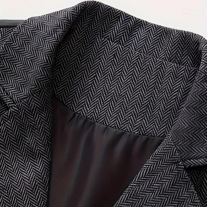 Men's herringbone waistcoat with front buttons, offering year-round style for formal events or smart casual wear.