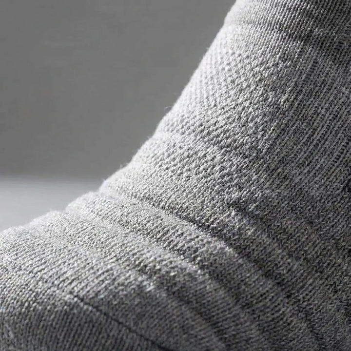 Men's high-tube workout & training compression socks providing support for active sports.