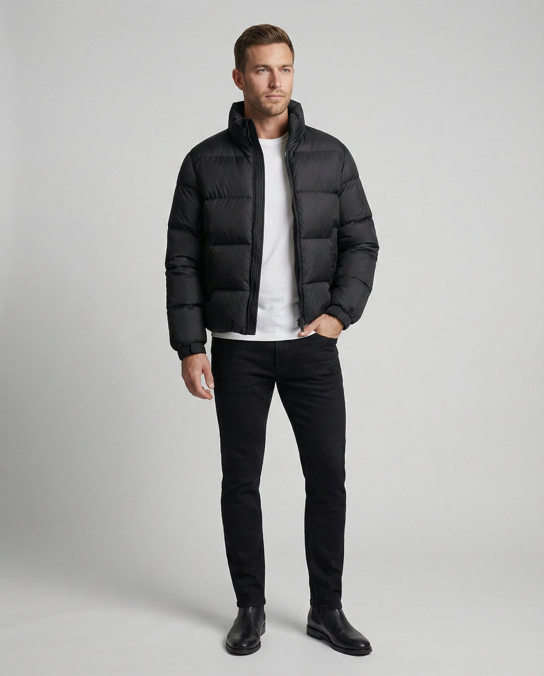 Stylish men's insulated puffer jacket with hood for winter. Offers warmth, wind protection & modern casual look.