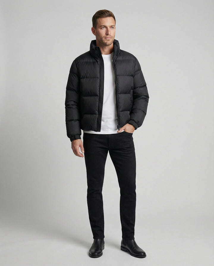 Stylish men's insulated puffer jacket with hood for winter. Offers warmth, wind protection & modern casual look.