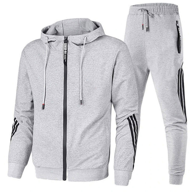Relaxed man in a comfortable men's hooded jogger set. Versatile two-piece lounge wear and casual outfit.