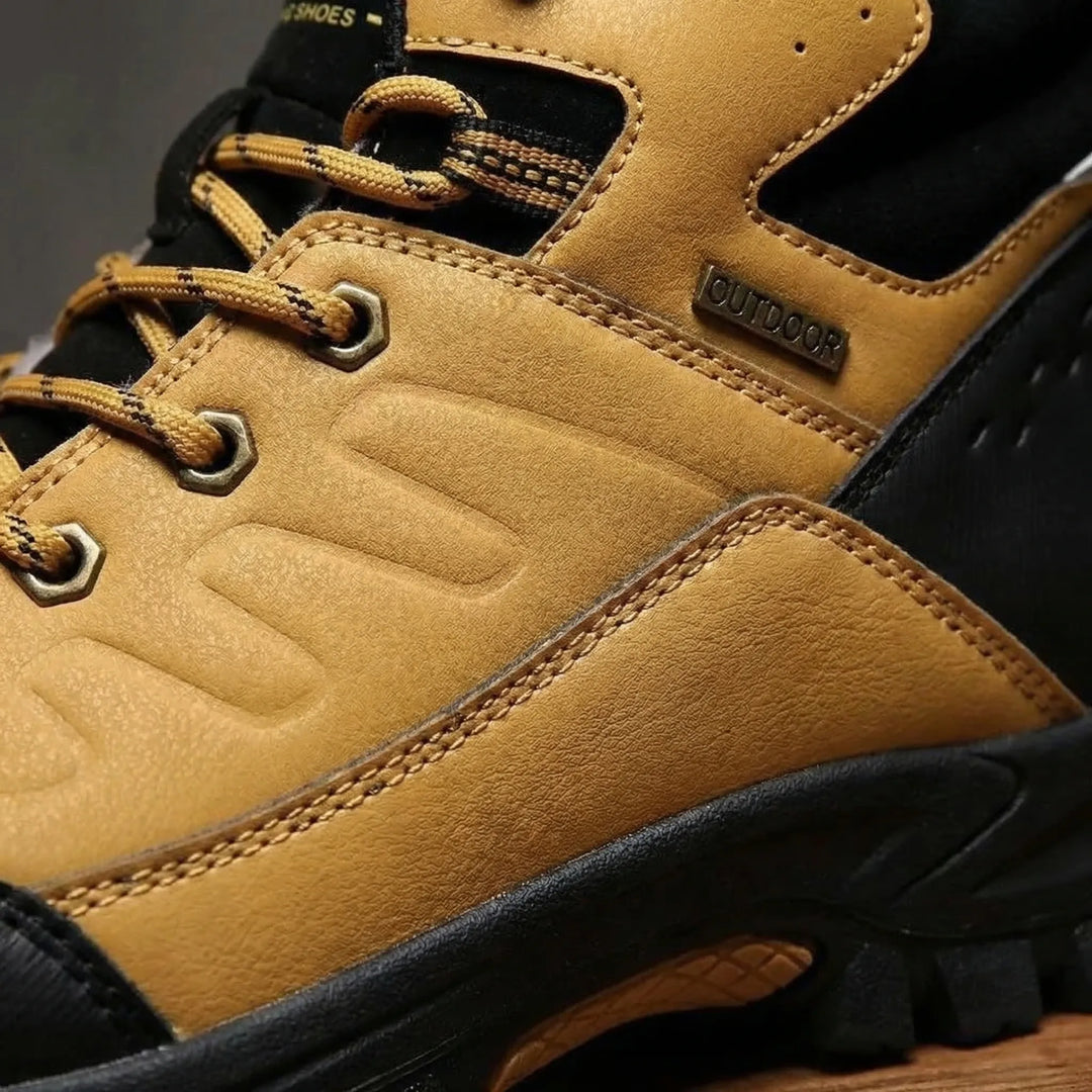 Durable high-top men's hiking boots, insulated for ultimate warmth in challenging winter conditions.