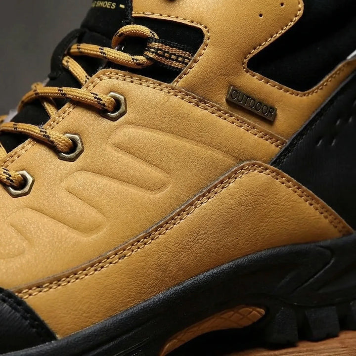 Durable high-top men's hiking boots, insulated for ultimate warmth in challenging winter conditions.