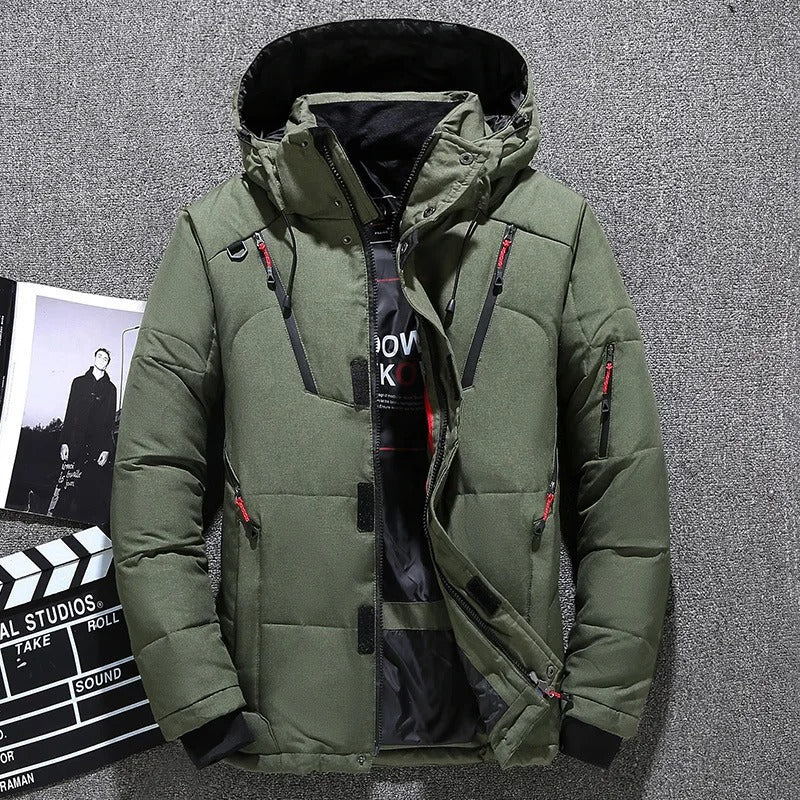Man wearing a versatile hooded puffer jacket, ideal for outdoor adventures and urban winter protection.