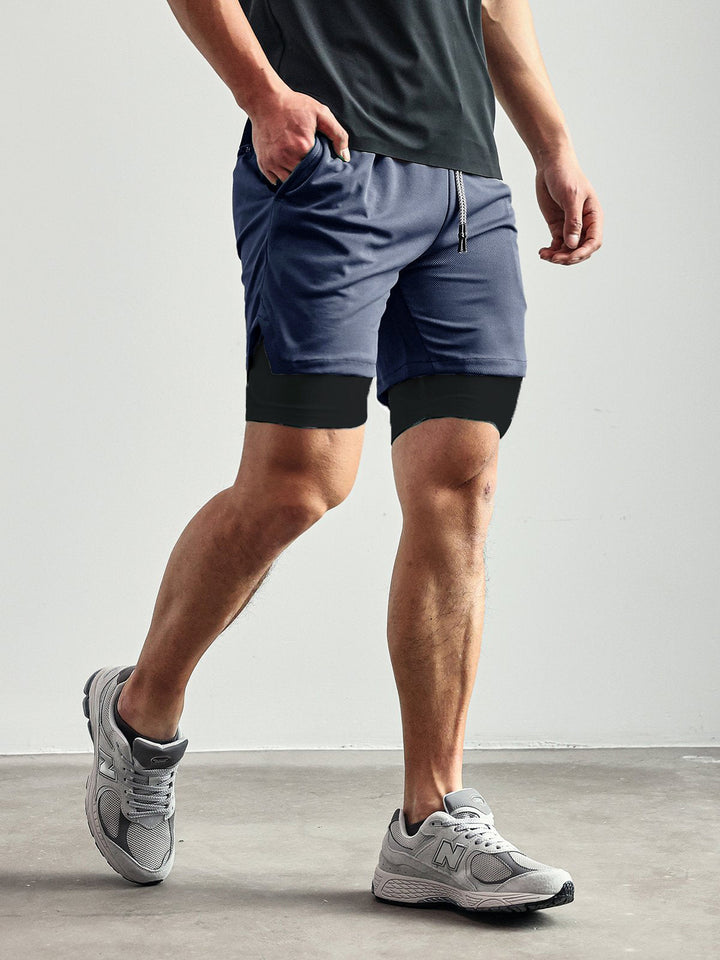 Lightweight men's Kinetic Performance active shorts. Breathable gym, workout, & summer apparel.