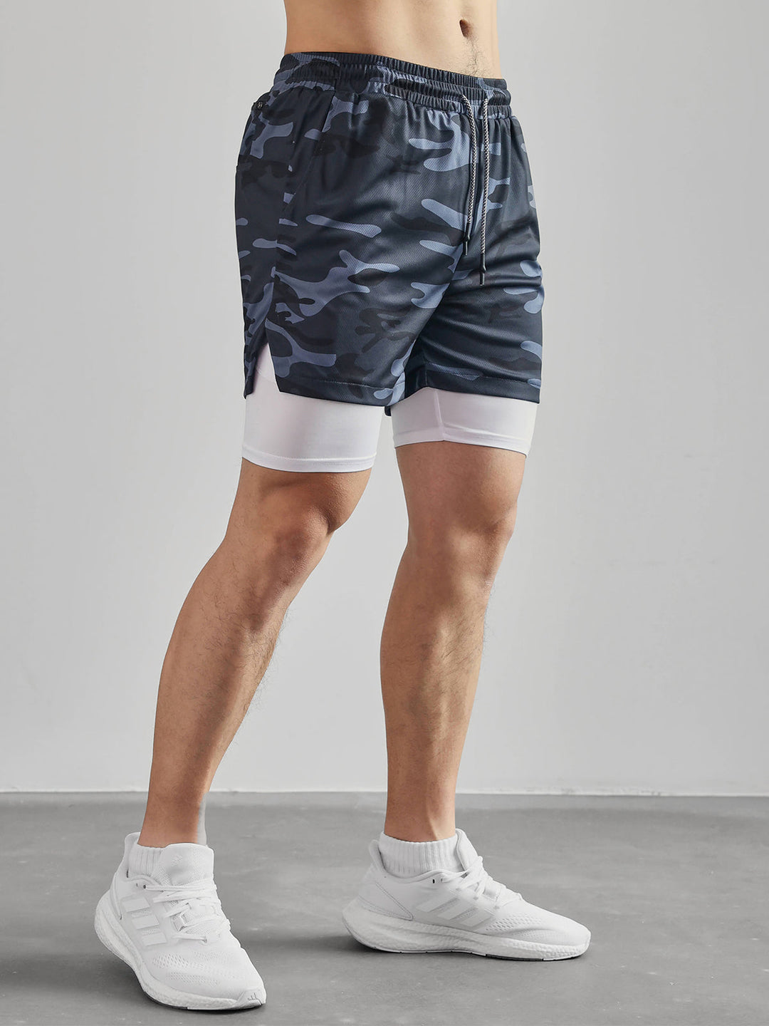 Side view of Men's Kinetic Performance Active Shorts. Performance athletic gym & workout apparel.