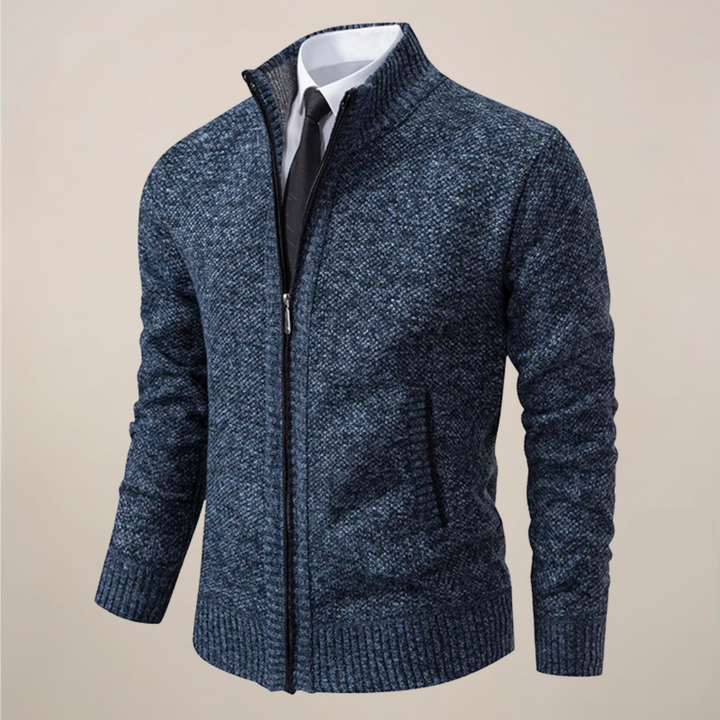 Stylish man wearing a charcoal knit zip-up cardigan with a shirt, demonstrating smart casual versatility.