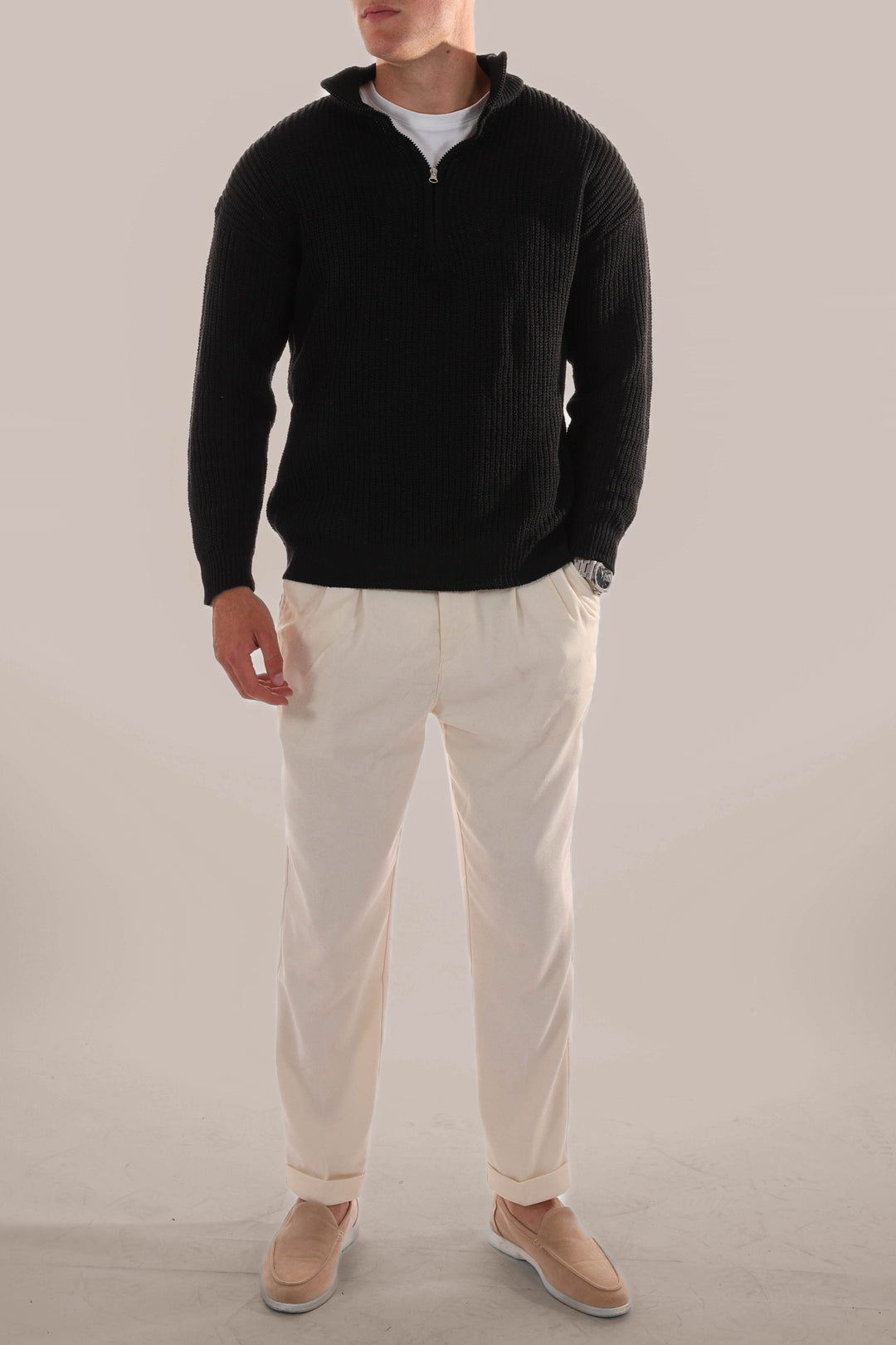 Classic men's knitted half zip jumper in a neutral color, a versatile staple for menswear fashion.