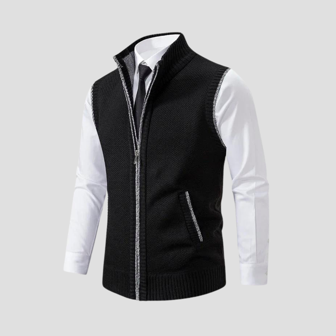 Close-up of a men's knitted zip vest, showing textured fabric for smart layering outfits.