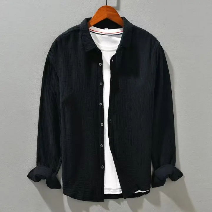 Stylish men's casual button-up shirt. Lightweight, breathable, and relaxed fit for warm weather.