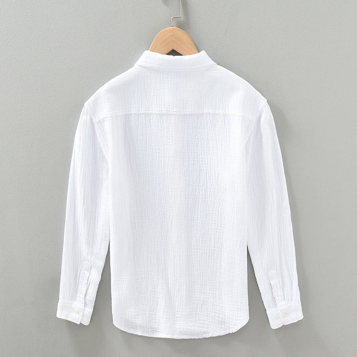 Man wearing a lightweight breathable casual button-up shirt, great for summer and relaxed outings.