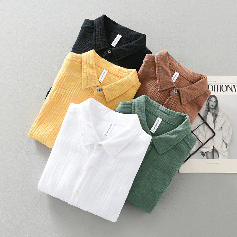 Relaxed fit men's lightweight button-up shirt with chest pocket, a breathable top for casual wear.