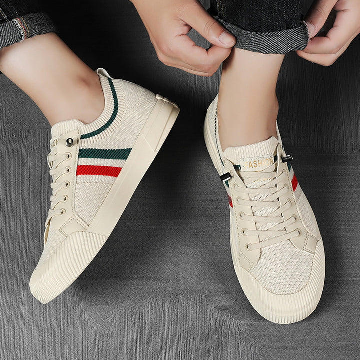 Stylish men's lightweight athletic sneakers, breathable with a modern lace-up design for comfort.