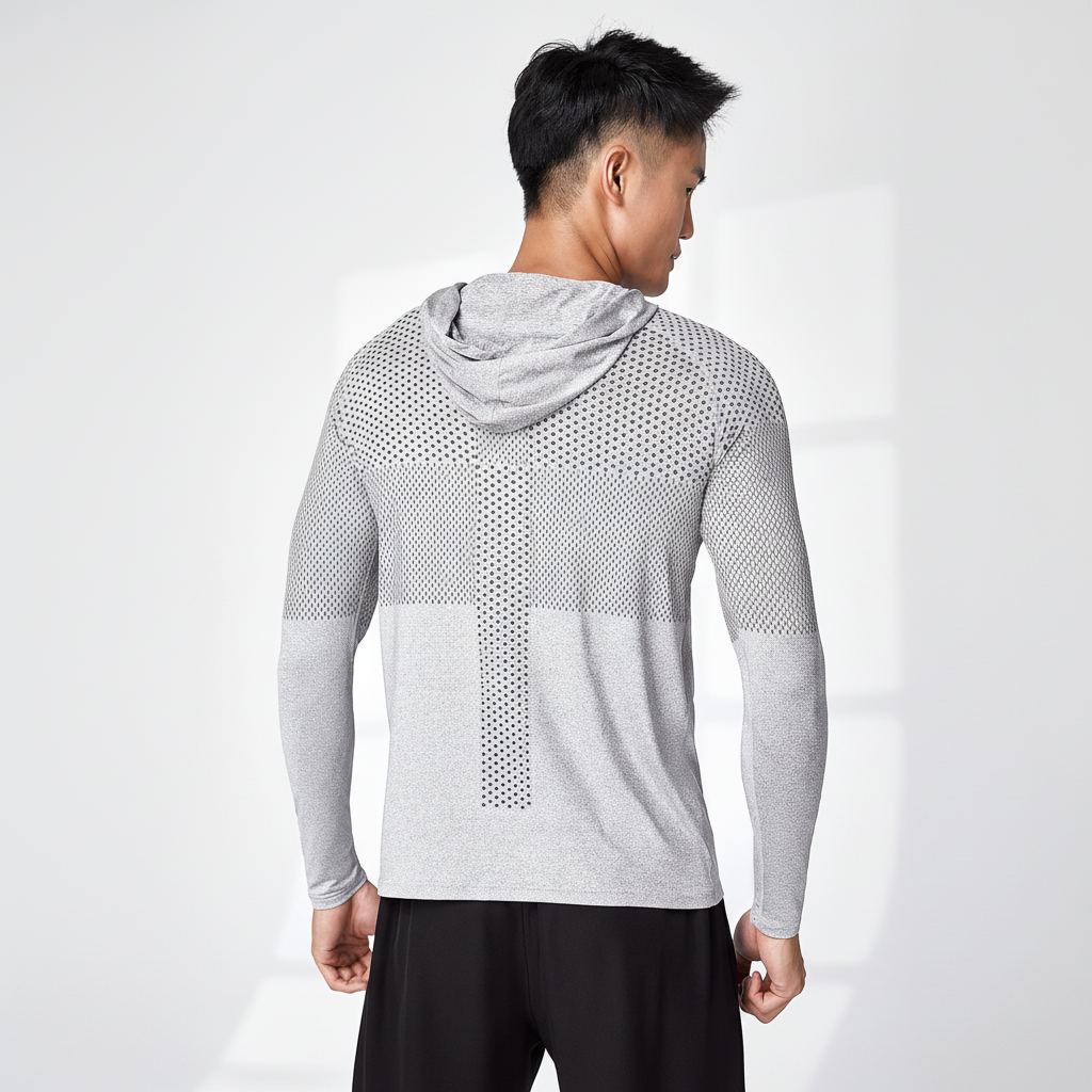 Men's lightweight performance training top with hood. Breathable, reflective sports apparel for running & active workouts.