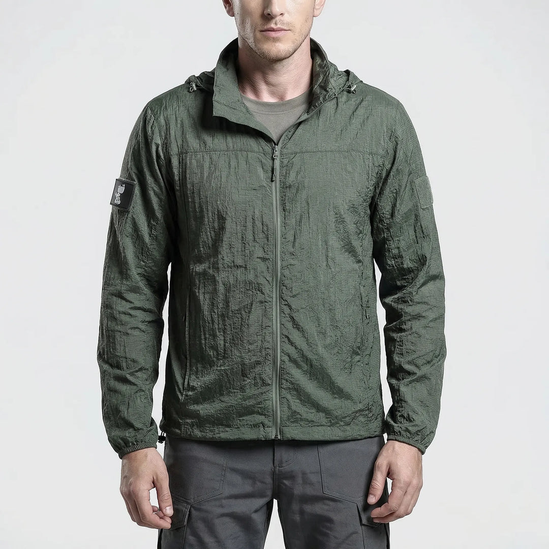 Packable men's hooded tactical windbreaker, water-resistant for hiking, camping & spring outdoor adventures.