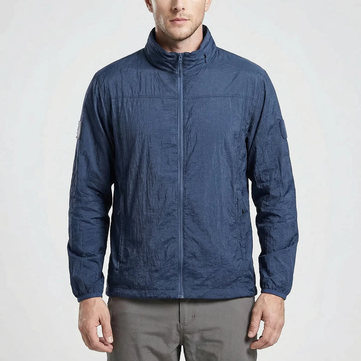 Durable men's tactical hooded windbreaker, water-resistant for protection during outdoor activities & travel.