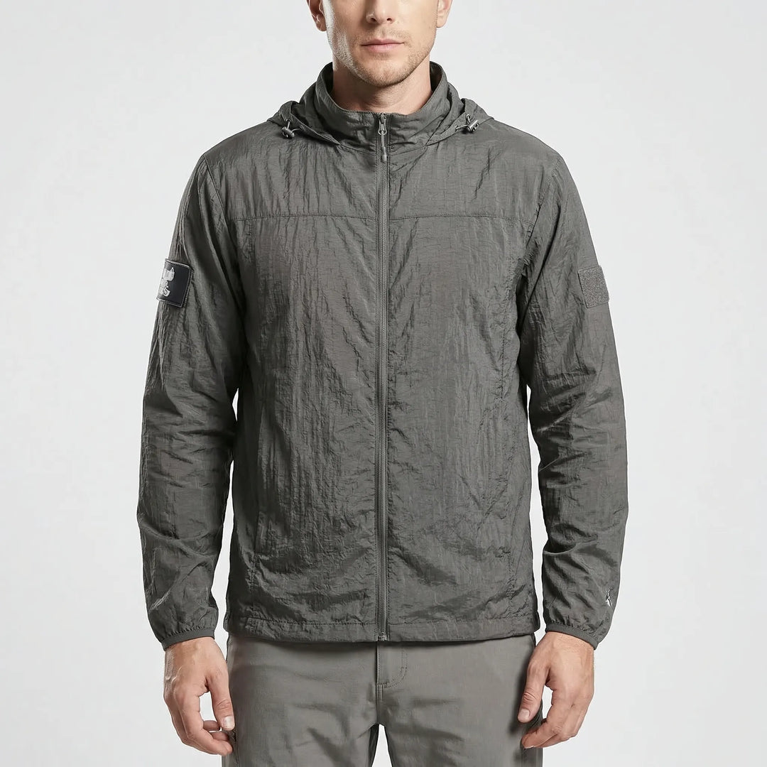 Stylish men's lightweight hooded windbreaker, versatile tactical jacket for everyday wear & active travel.