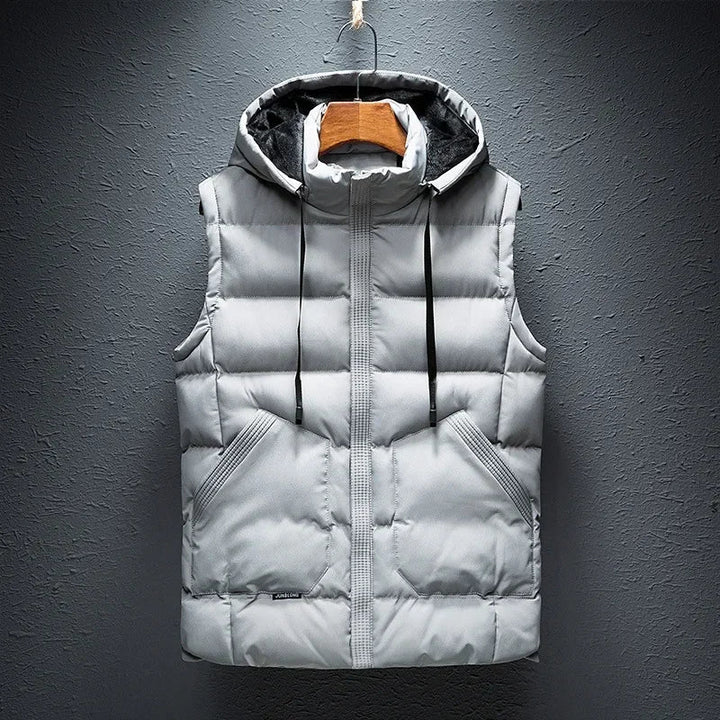 Stylish men's hooded vest, sleeveless & lightweight, perfect for casual warmth & outdoor layering.