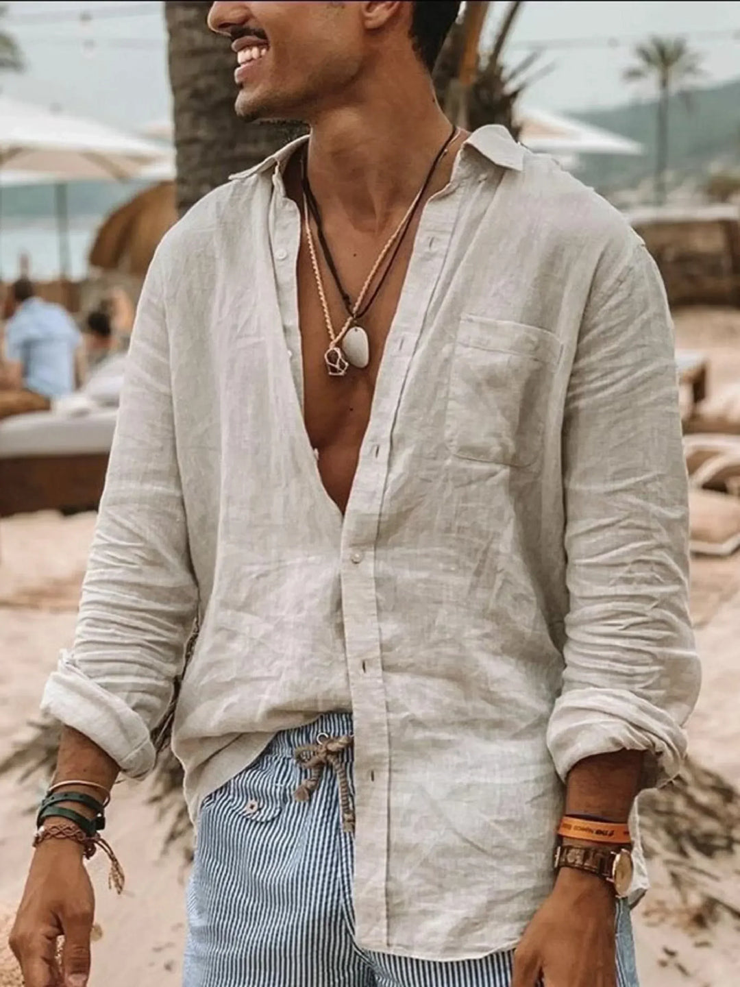 Relaxed fit men's linen button-up shirt, great for summer fashion. Stylish lightweight casual long sleeve.