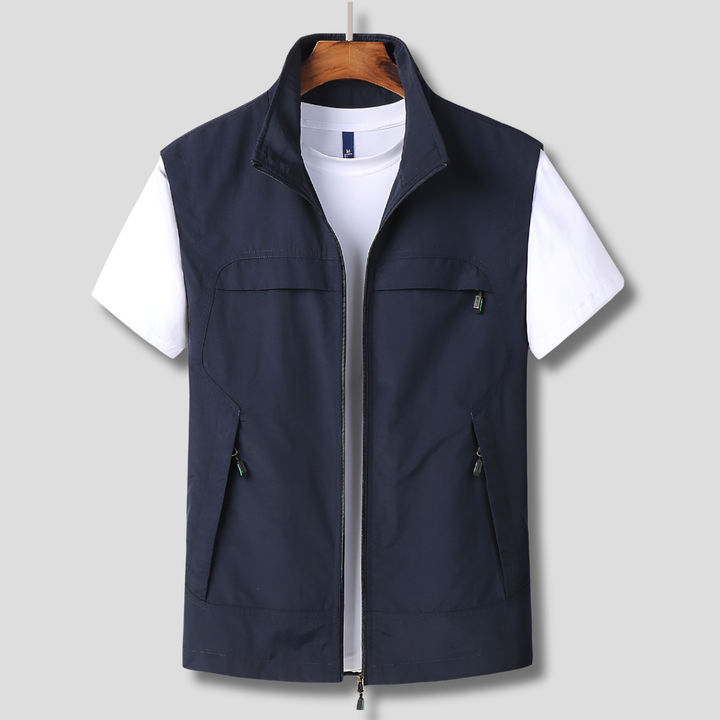 Men's lightweight outdoor zip vest with multiple pockets for hiking, travel & casual wear. Available in navy.