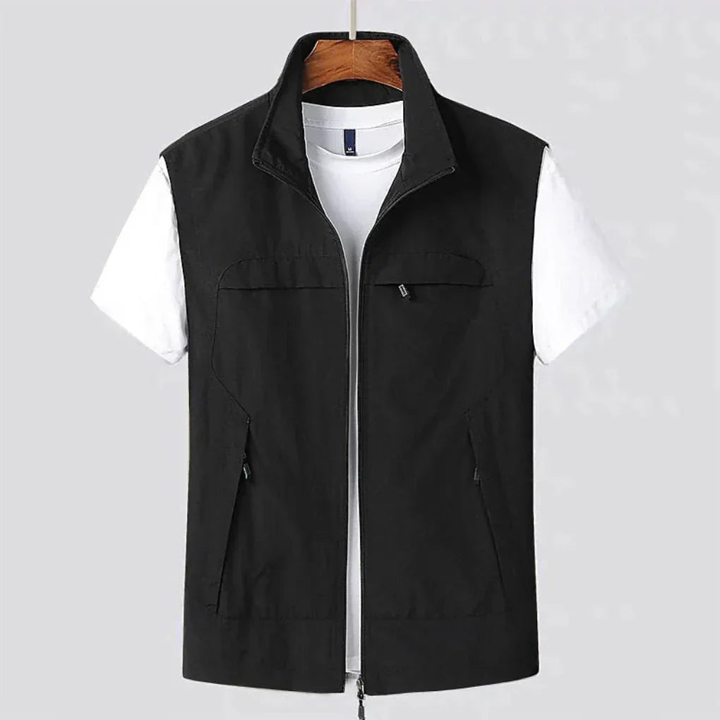 Breathable, quick-dry men's zip vest perfect for outdoor adventures, hiking, and layering. Multi-pocket design.