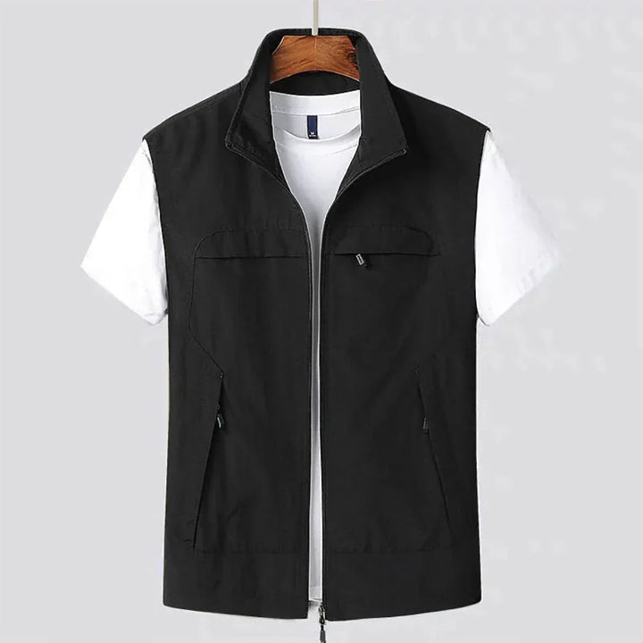 Breathable, quick-dry men's zip vest perfect for outdoor adventures, hiking, and layering. Multi-pocket design.