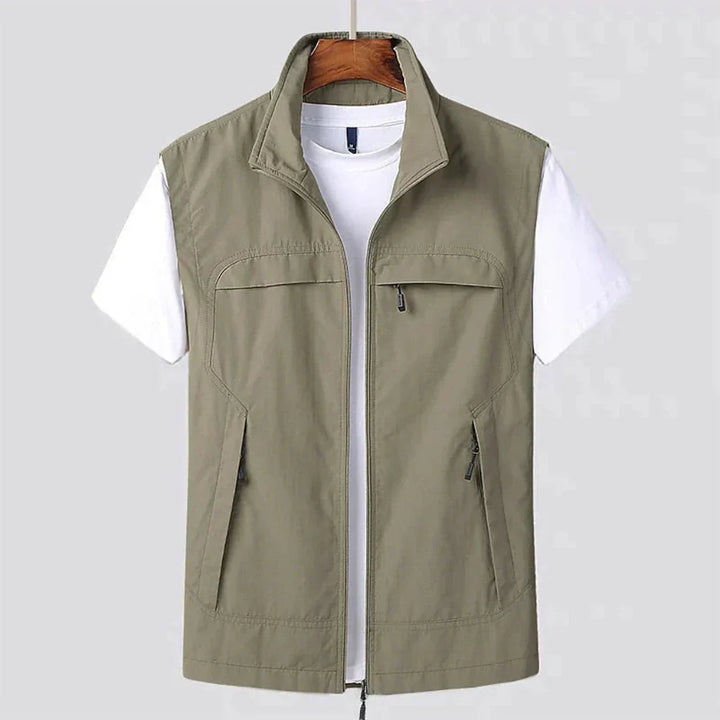 Stylish men's lightweight outdoor zip vest. Practical multi-pockets for essentials. Ideal for hiking, travel & daily wear.