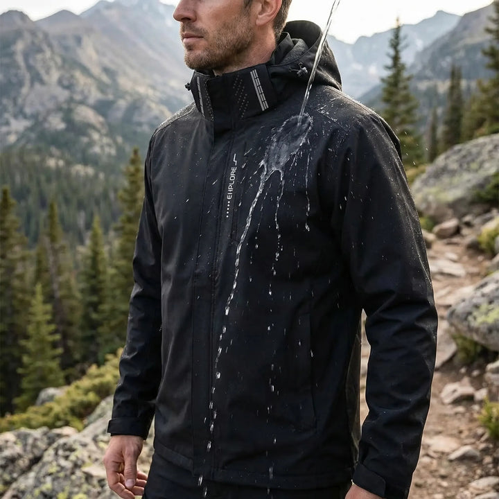 Men's lightweight packable hooded windbreaker jacket, full zip, water repellent for active outdoor wear.