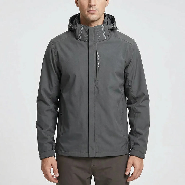Stylish men's hooded windbreaker, lightweight & water repellent, a versatile packable jacket for outdoor activity.