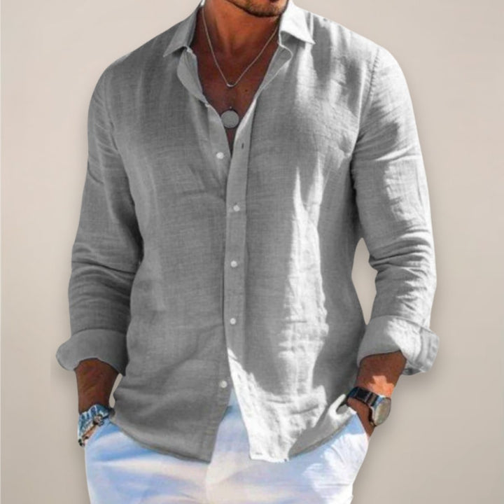 Breathable men's lightweight long sleeve button-up shirt for comfortable everyday wear in spring & summer fashion.