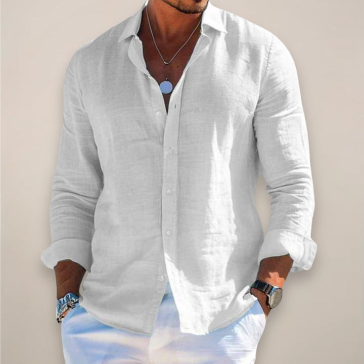 Relaxed fit men's button-up shirt, ideal for casual spring/summer outfits & versatile layering. Everyday style.