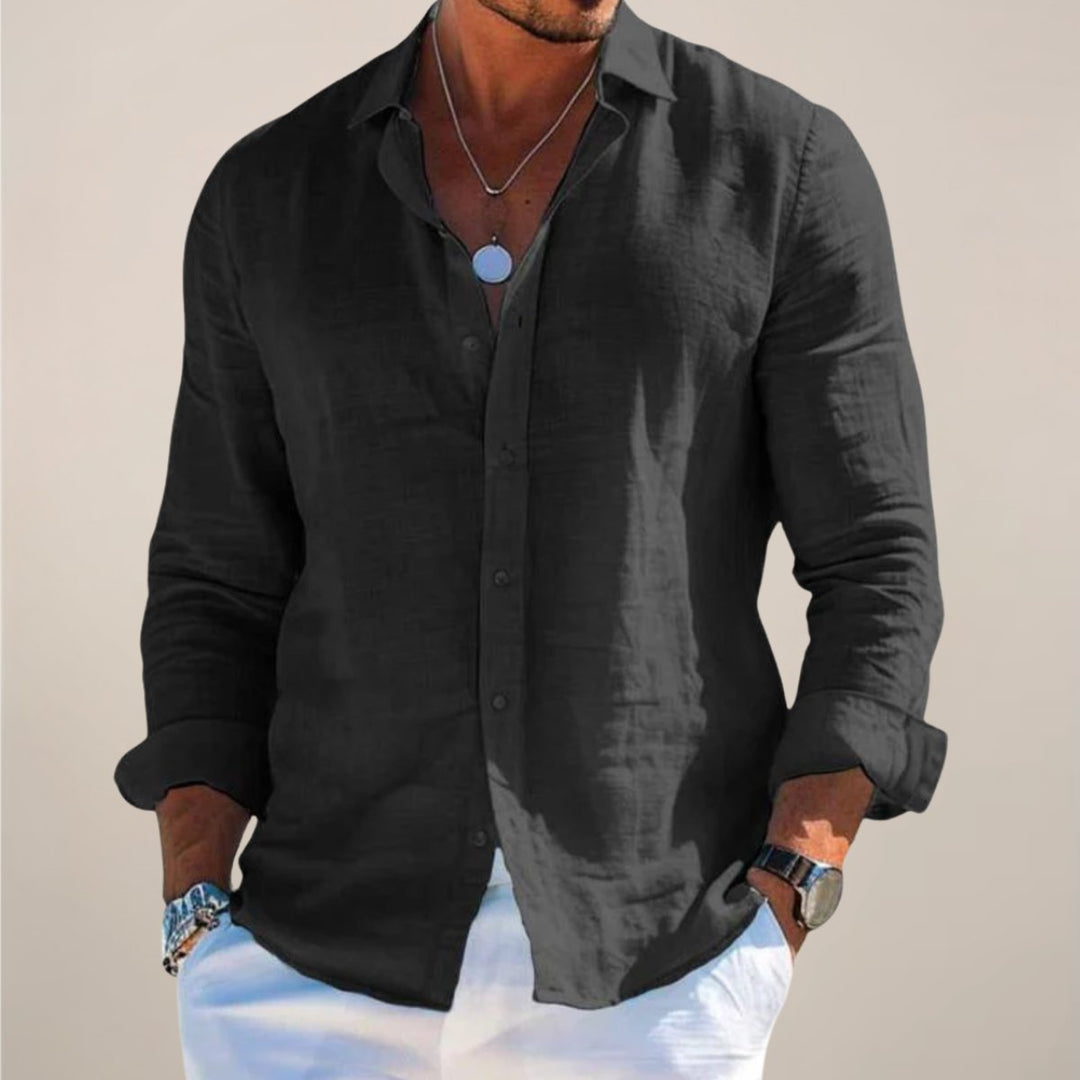 Stylish men's lightweight long sleeve button-up shirt with a relaxed fit, great for spring/summer fashion trends.