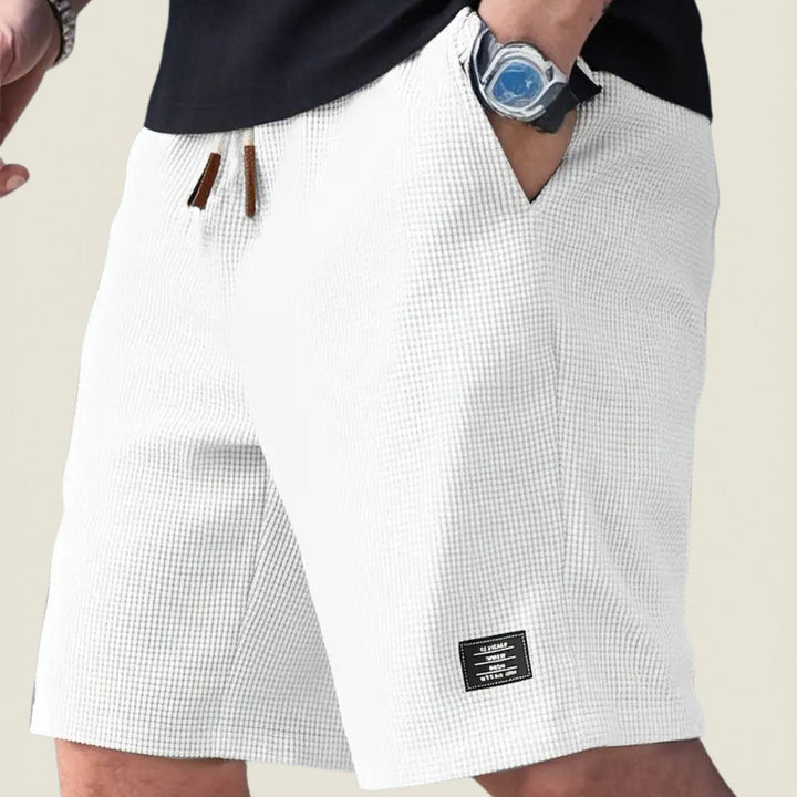Men's comfortable lightweight shorts, relaxed fit for summer adventures, perfect for outdoor style.