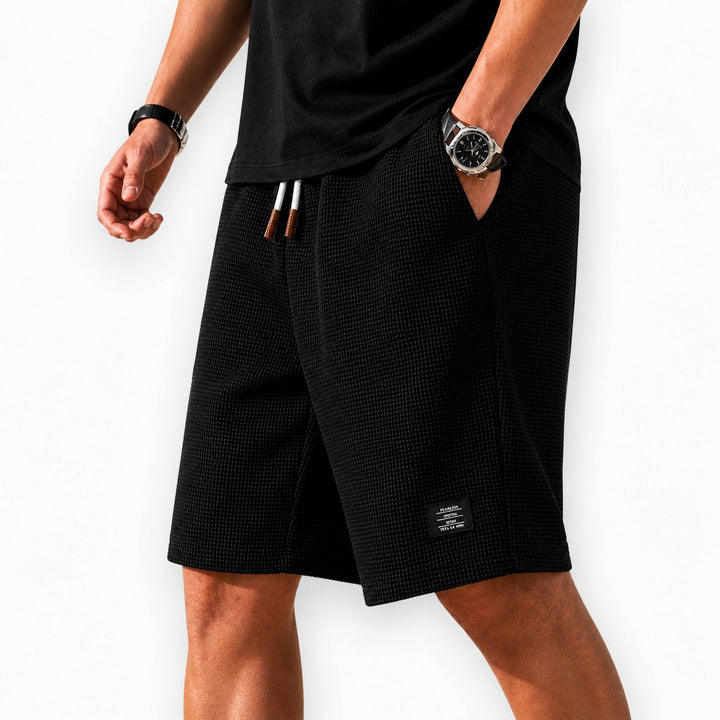 Lightweight summer shorts for men, offering breathable comfort & relaxed fit for warm weather outdoor style.