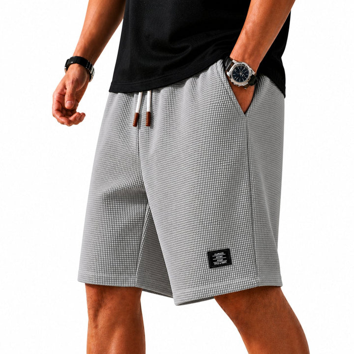 Casual men's shorts, relaxed fit for summer fashion, great for everyday comfort in warm weather.
