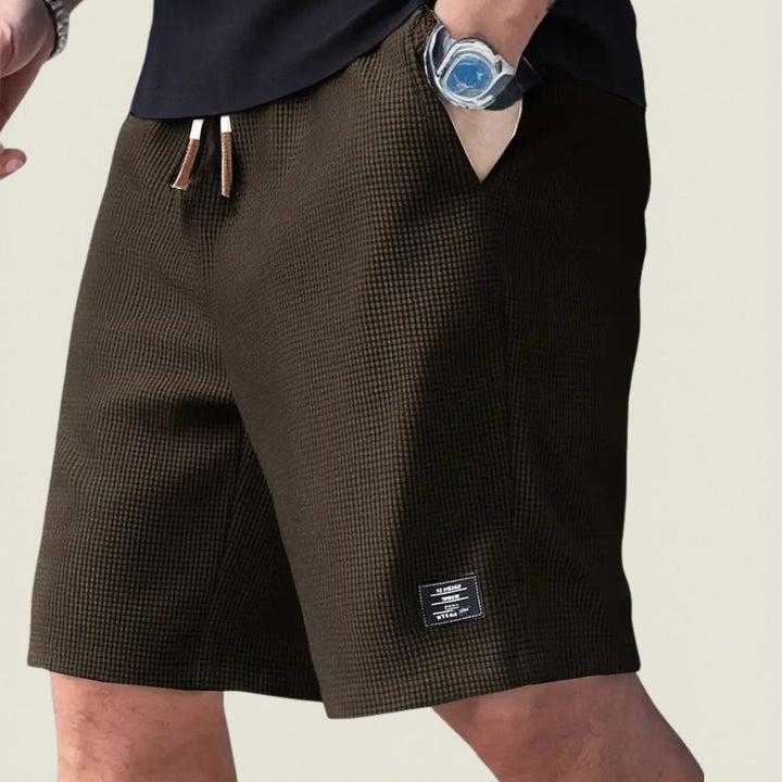 Men's apparel: lightweight summer comfort shorts with a relaxed fit for ultimate wear in warm weather.