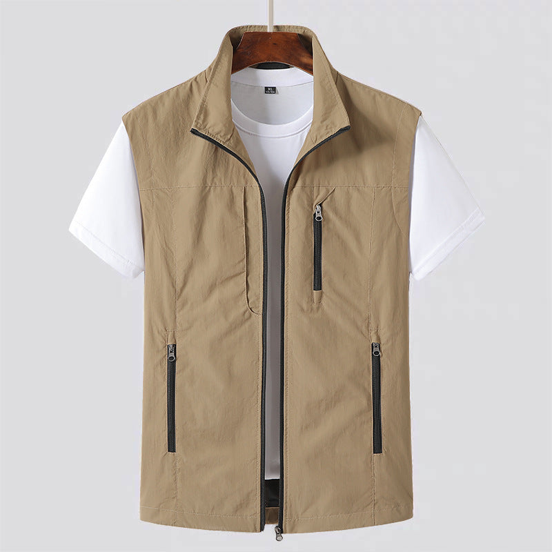 Comfortable men's summer travel vest. Lightweight, multi-pocket sleeveless jacket for casual outdoor adventures.