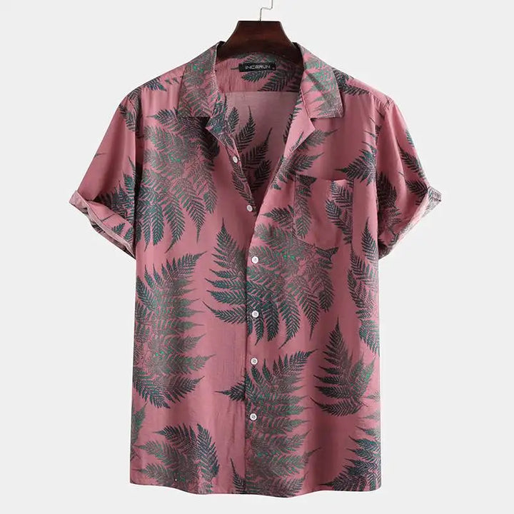 Relaxed fit men's short sleeve tropical summer shirt, breathable fabric, ideal for casual beach days.